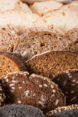 Bakery concept. Plenty of sliced bread background