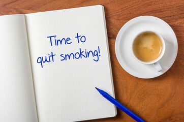 Notebook on a desk - Time to quit smoking