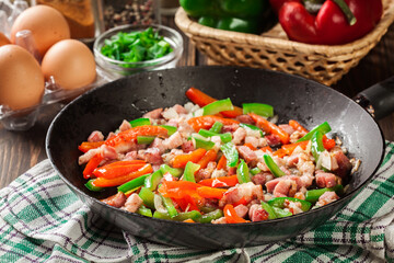 Frieding ingredients for preparing omelette