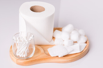 Cotton wool pad tissue roll on white