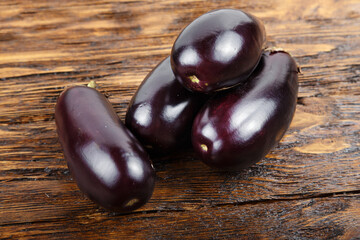 eggplants on a wooden table