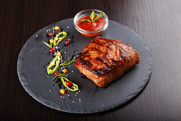 Steak on slate blackboard