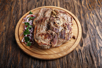 Obraz na płótnie Canvas ribeye steak on a board