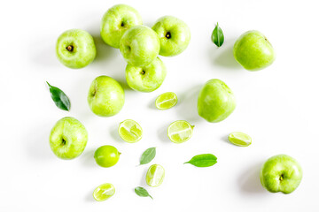 fitness food with green apples on white background top view