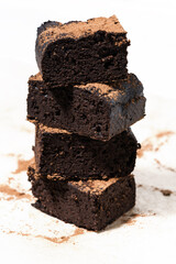 dessert - pieces of chocolate brownies, vertical