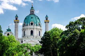 Fototapeta na wymiar the facade of the Karlskirche (Saint Charles Church) in Vienna, Austria, seen from the public gardens of Karlsplatz 