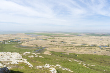 Fototapeta na wymiar Beautiful panorama from Enisala Medieval Fortress also referred as Heracleea Fortress with Razim lake in the background, Tulcea county, Dobrogea region, Romania, in a sunny spring day 