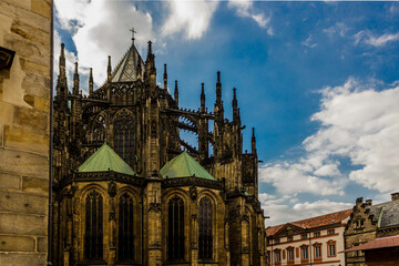 Details of the Gothic cathedral. Western facade. Gargoyle, pinnacle,spire,arbutan,rosette,stained glass window.Cathedral of Saints Vitus . Area of the Old Town of Prague, Czech Republic.