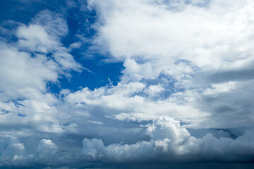 blue sky background with tiny clouds