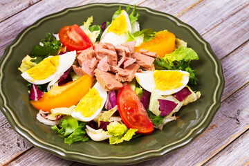 Tuna salad. Fish, eggs and vegetable salad