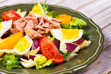 Tuna salad. Fish, eggs and vegetable salad