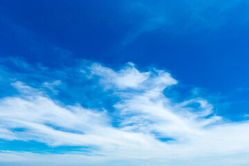 Fototapeta premium blue sky background with tiny clouds