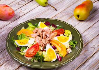 Tuna salad. Fish, eggs and vegetable salad
