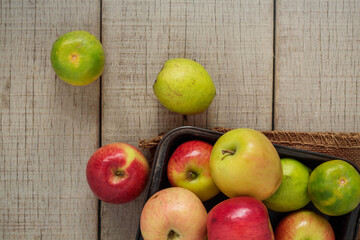 Apple on wooden.