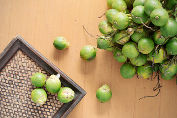 betel nut and tray on wooden.