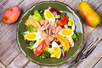 Tuna salad. Fish, eggs and vegetable salad