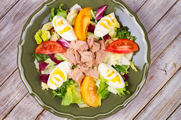 Tuna salad. Fish, eggs and vegetable salad
