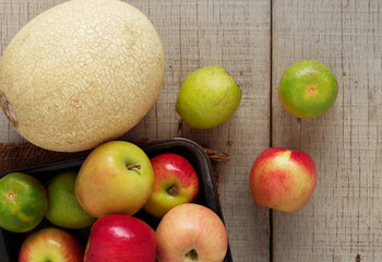 fruits on wooden floor.