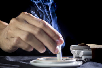 Fototapeta na wymiar White smoke cigarettes concept abstain from smoking.