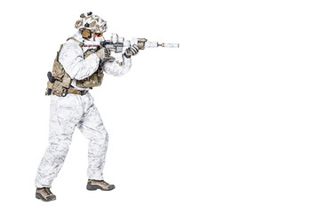 Special forces operator of Navy Seals armed with assault rifle with closed face in polarized...