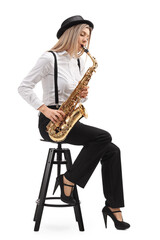 Female jazz musician seated on a chair playing a saxophone