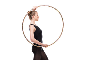 attractive rhythmic gymnast in leotard smiling and posing with hoop isolated on white © LIGHTFIELD STUDIOS