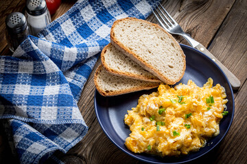 Scrambled eggs with onion and chives.