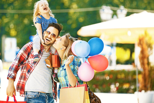 Happy Family In Shopping