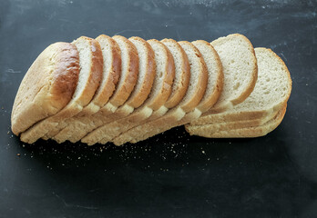 Sliced bread on black background
