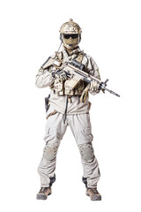 Army soldier in Protective Combat Uniform holding Special Operations Forces Combat Assault Rifle. Knee pads, mag recovery pouch, chest rig, military boots. Studio shot, isolated on white background