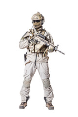 Army soldier in Protective Combat Uniform holding Special Operations Forces Combat Assault Rifle. Knee pads, mag recovery pouch, chest rig, military boots. Studio shot, isolated on white background