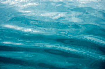 Rippled blue water surface - obrazy, fototapety, plakaty