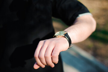 Portrait of a young man in love who is waiting for his girlfriend