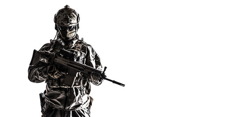 Army soldier in Protective Combat Uniform holding Special Operations Forces Combat Assault Rifle....