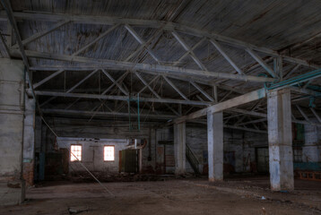 Fototapeta na wymiar Dilapidated workshop of the abandoned factory. HDR.