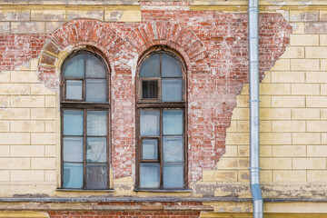 Two windows on facade of Petersburg Art XX-XXI Centuries Museum, St. Petersburg, Russia.
