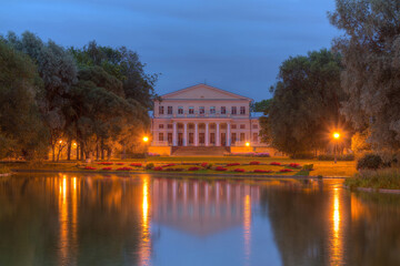 Fototapeta na wymiar Night view of pond, park and palace in Yusupov Garden, Saint Petersburg, Russia.