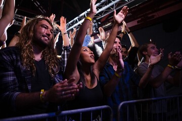 Crowd dancing and enjoying a rock concert