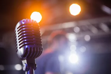 Tuinposter Retro microphone at a concert © WavebreakMediaMicro