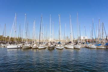 Obraz premium Street view of Barcelona harbor with boats, Spain Europe