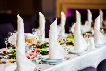 The colored cake on buffet