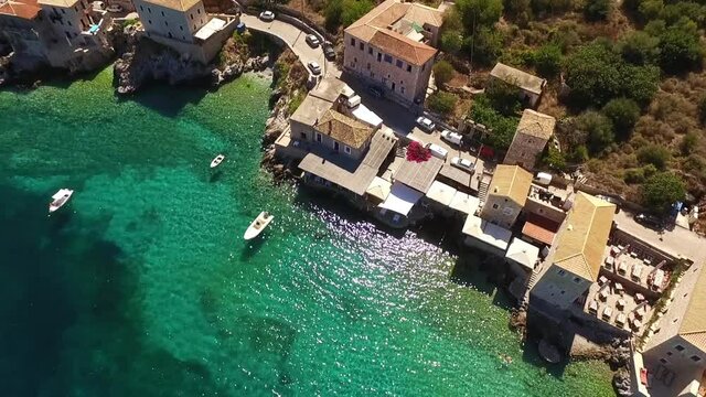 Aerial drone video of picturesque village of Limeni with clear waters, Mani, Peloponnese, Greece