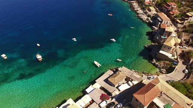 Aerial drone video of picturesque village of Limeni with clear waters, Mani, Peloponnese, Greece