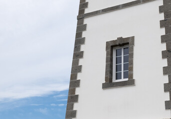 Lighthouse detail with window overlooking the sea