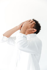 African man isolated over white background covering face