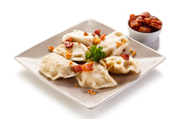 Dumplings - stuffed noodles on white background