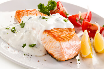 Grilled salmon on white background