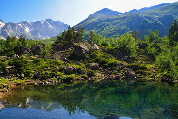 Naklejka na ściany i meble Mountain Lake in the highlands of the Caucasus