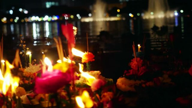 Loy Kratong Festival celebrated in Thailand. Launch boats from flowers and candles in the pond. 3840x2160
