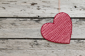 Valentines day background with heart on wooden background